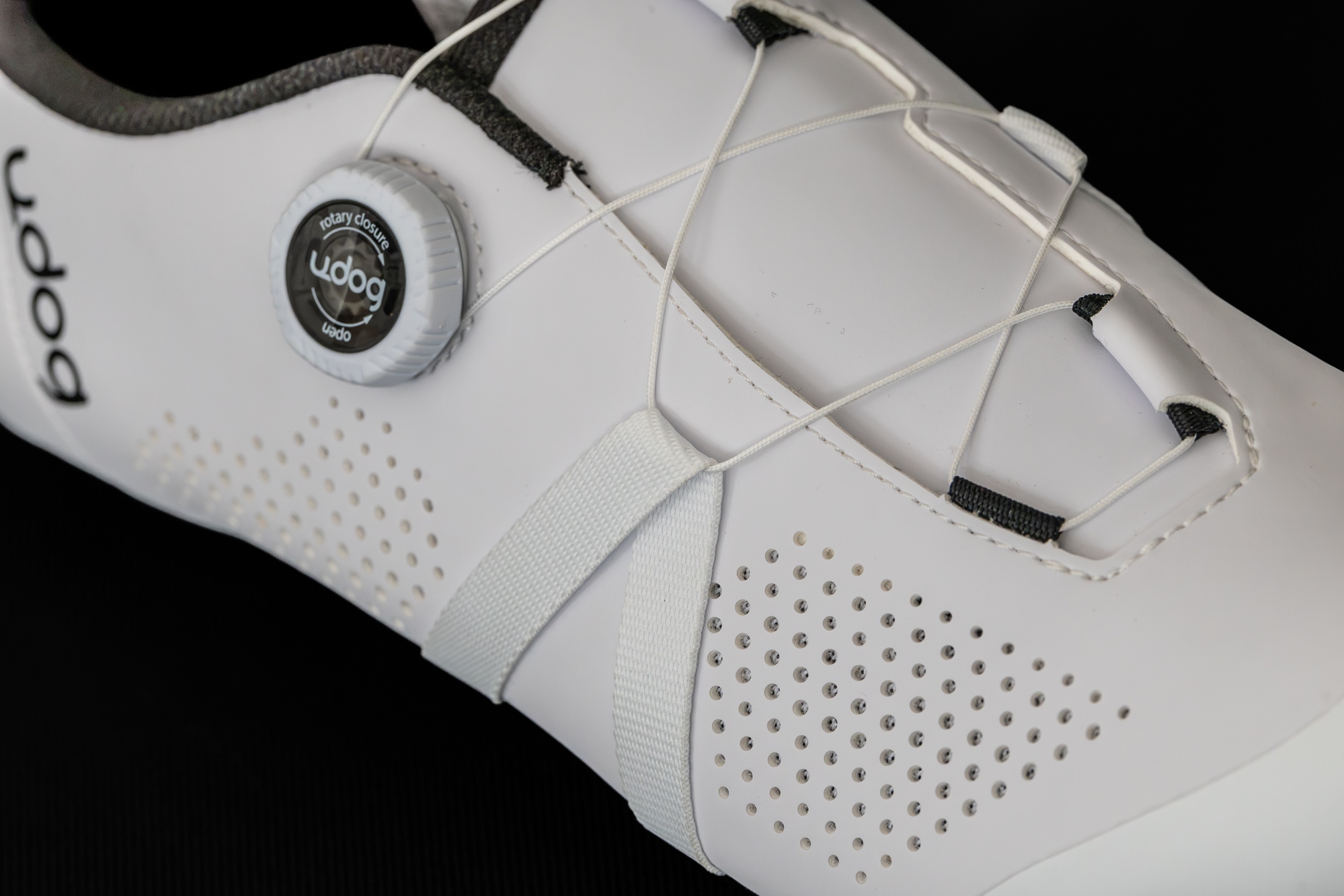 close up of the tension wrap system on a white cycling shoe
