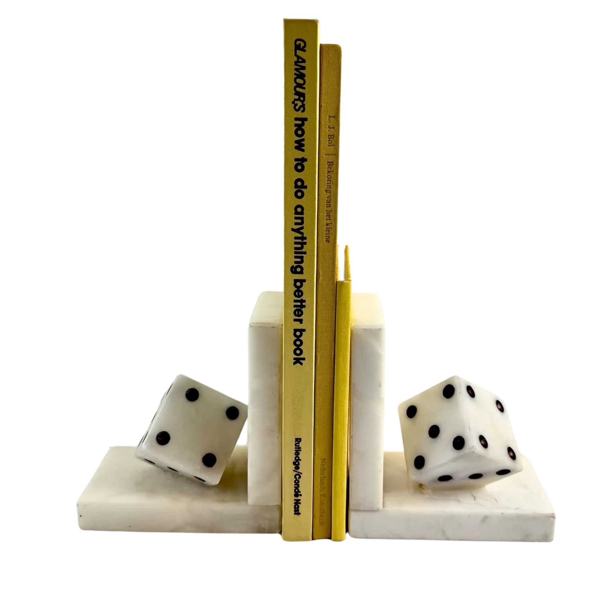 set of vintage bookends in marble with two dice on either side, holding up a set of yellow books