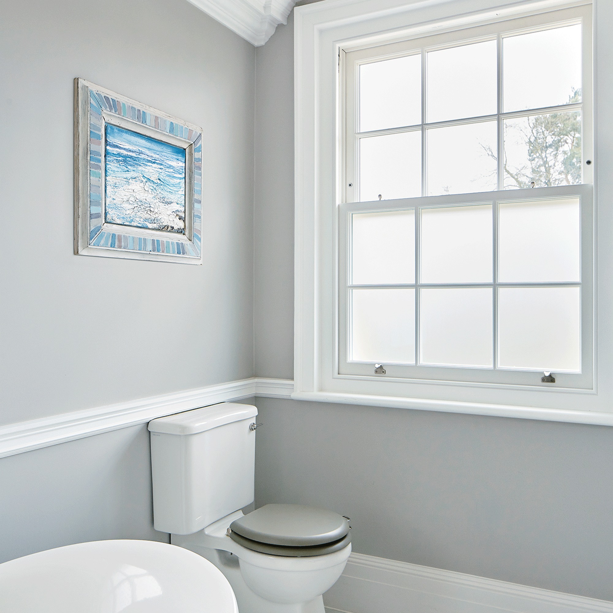 Frosted glass window in bathroom