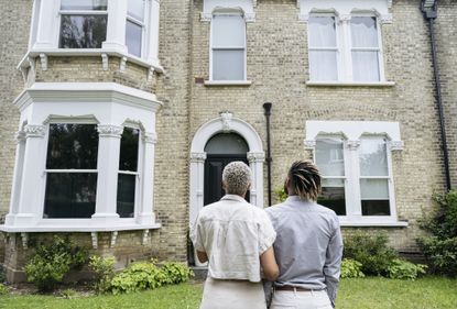 couple looking at a house