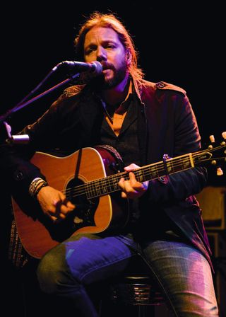 Rich Robinson of American rock band The Black Crows live on stage at the Shepherds Bush Empire, July 12, 2011