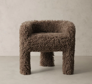 A brown faux fur chair