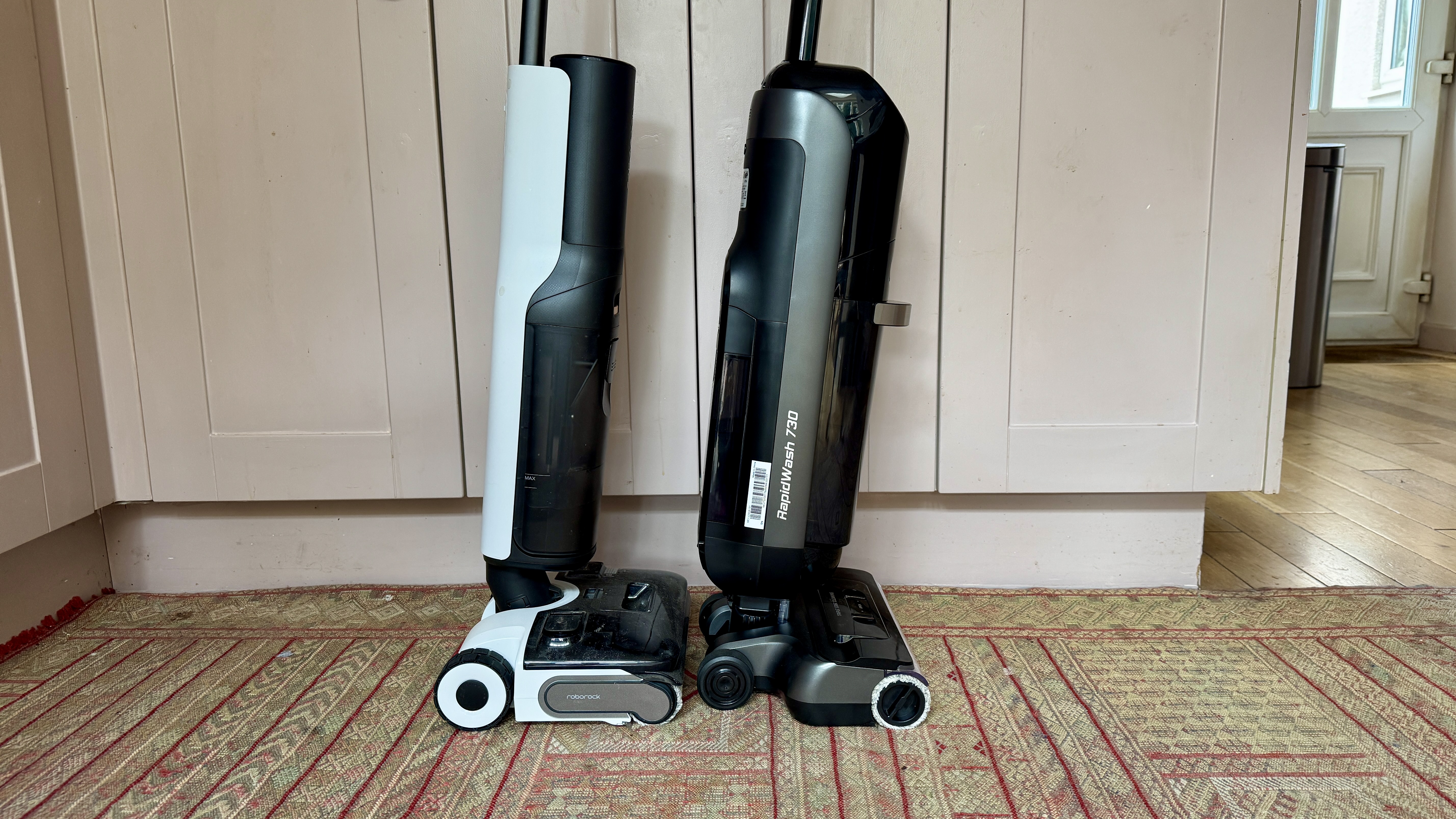 Eureka RapidWash 730 next to the Roborock F25 ACE cleaner