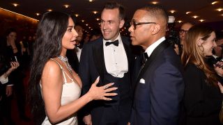 Kim Kardashian talks to Don Lemon and his partner Tim Malone at the Time 100 Gala.