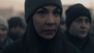 Rita disguised and looking at June in Execution