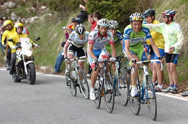 The leading four near the summit of the Monta Grappa: Ivan Basso and Vincenzo Nibali (Liquigas - Doimo), Michele Scarponi (Androni Giocattoli) and world champion Cadel Evans (BMC).