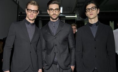 3 men in Giorgio Armani suits