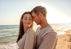 An attractive couple on the beach.