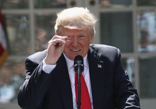 Donald Trump announces his decision for the United States to pull out of the Paris climate agreement in the Rose Garden at the White House June 1, 2017 in Washington, D.C.