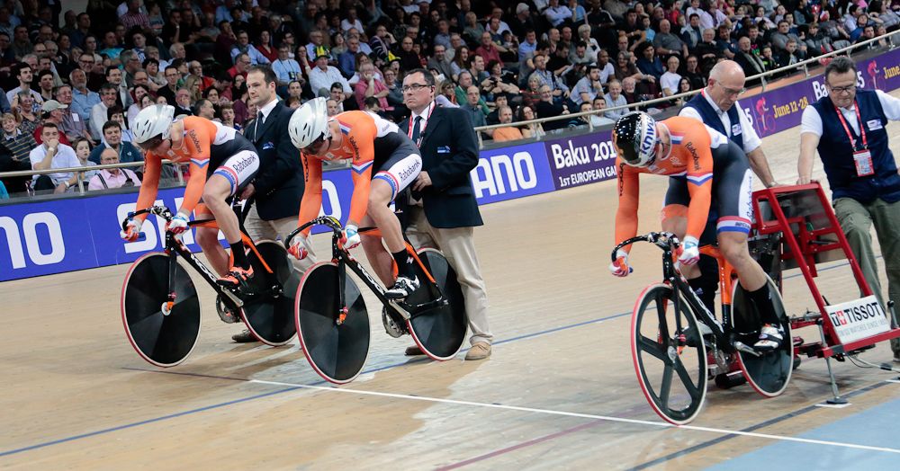 The Dutch team sprint riders prepare for their effort.