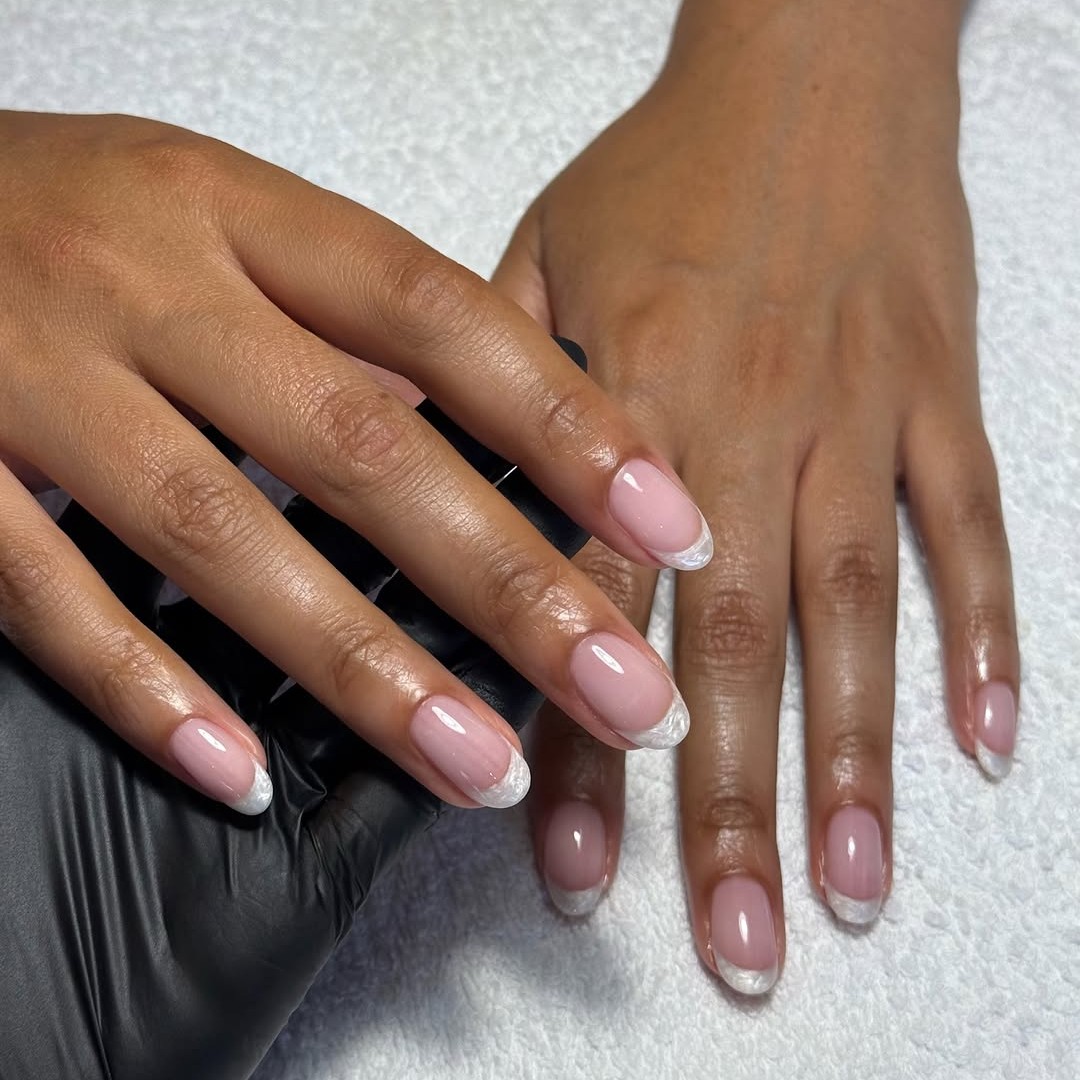 A swirly pearly bridal manicure.