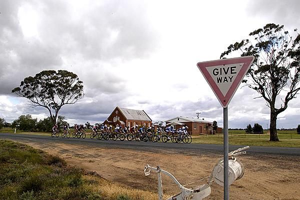 Riders pass a church on the outskirts of Moama during the 112.9 kilometre third stage of the tour.