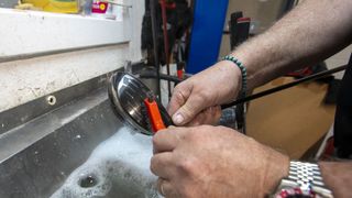 Golf clubs being cleaned