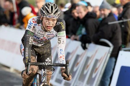 A muddy David van der Poel (BKCP - Powerplus) crosses the finish line.