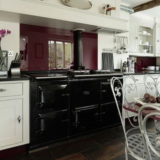 kitchen room with range cooker and grey wooden flooring