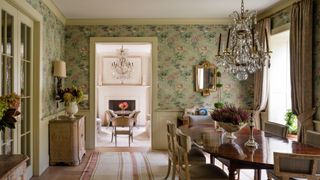 Edwardian style dining room with floral wallpaper