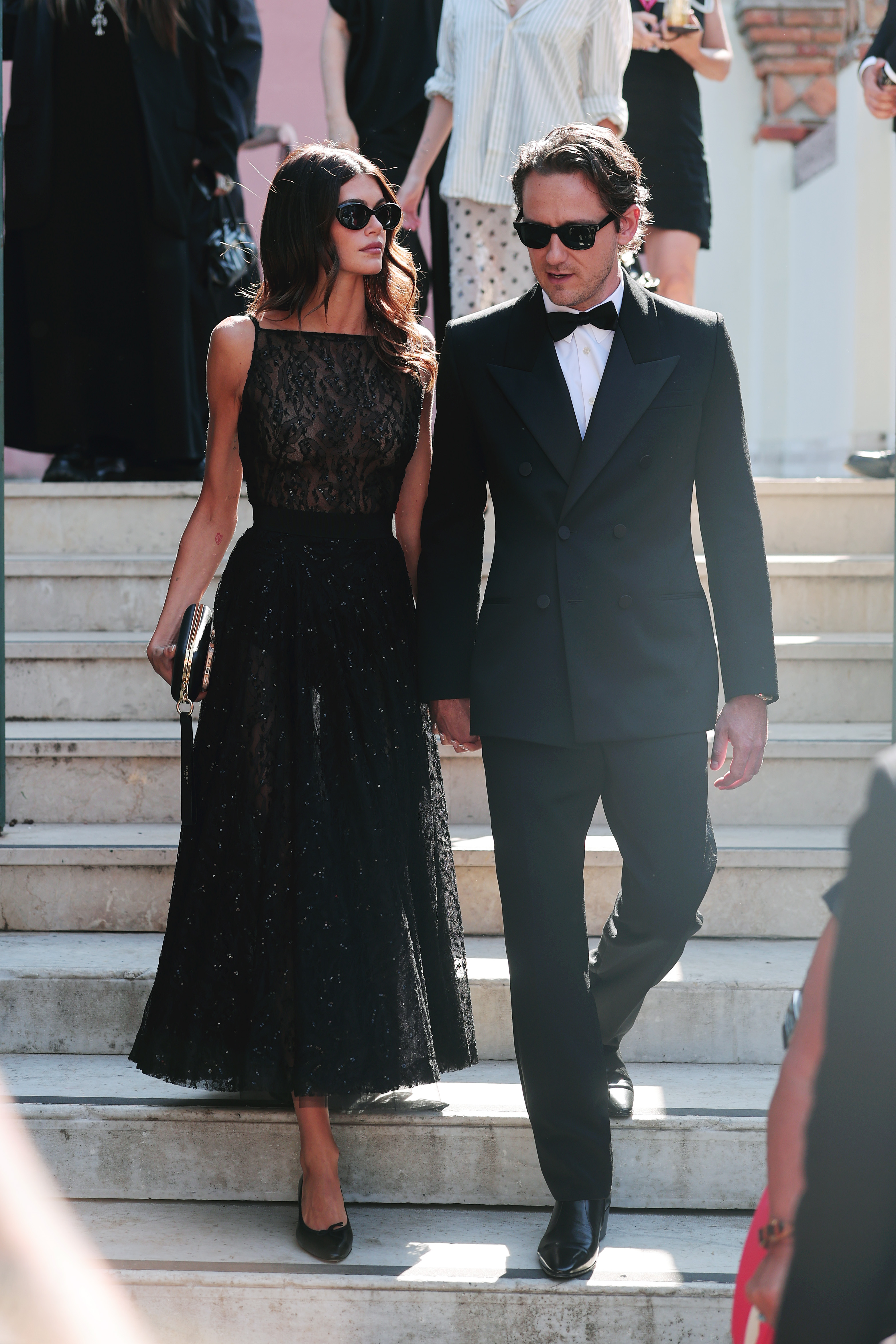 Kaia Gerber wears a lace Givenchy gown at Venice Film Festival