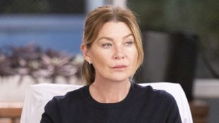 Ellen Pompeo as Meredith Grey in a black shirt thinking in Grey's Anatomy season 19