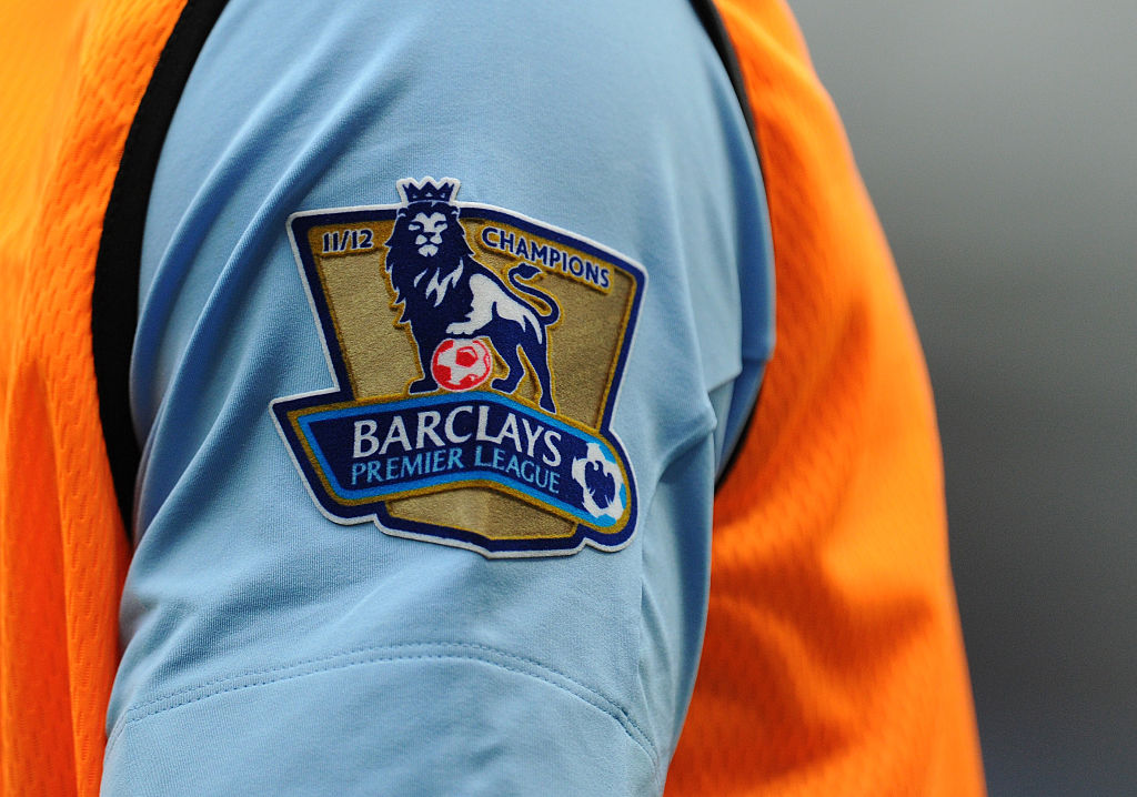 The gold badge on the Manchester City shirt commemorating their Barclays Premier League season 11/12 championship