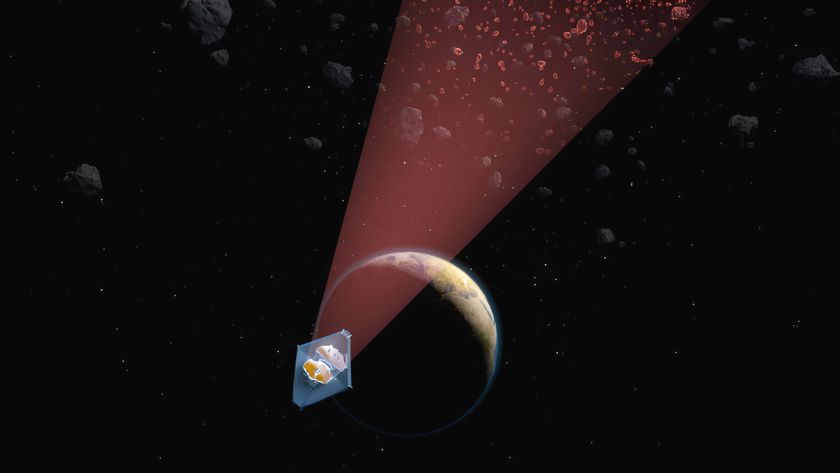 An artist’s illustration of NASA’s James Webb Space Telescope revealing, in the infrared, a population of small main-belt asteroids.