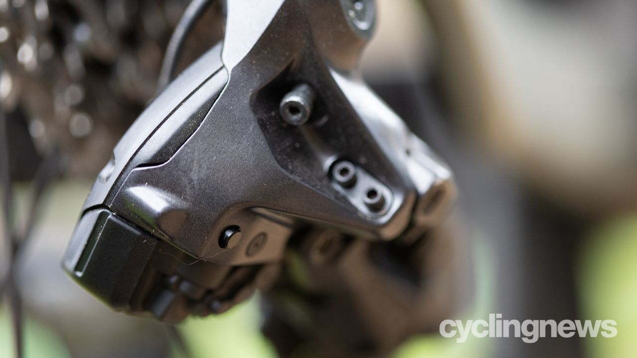 Shimano Ultegra R8100 groupset detail of rear derailleur showing function button