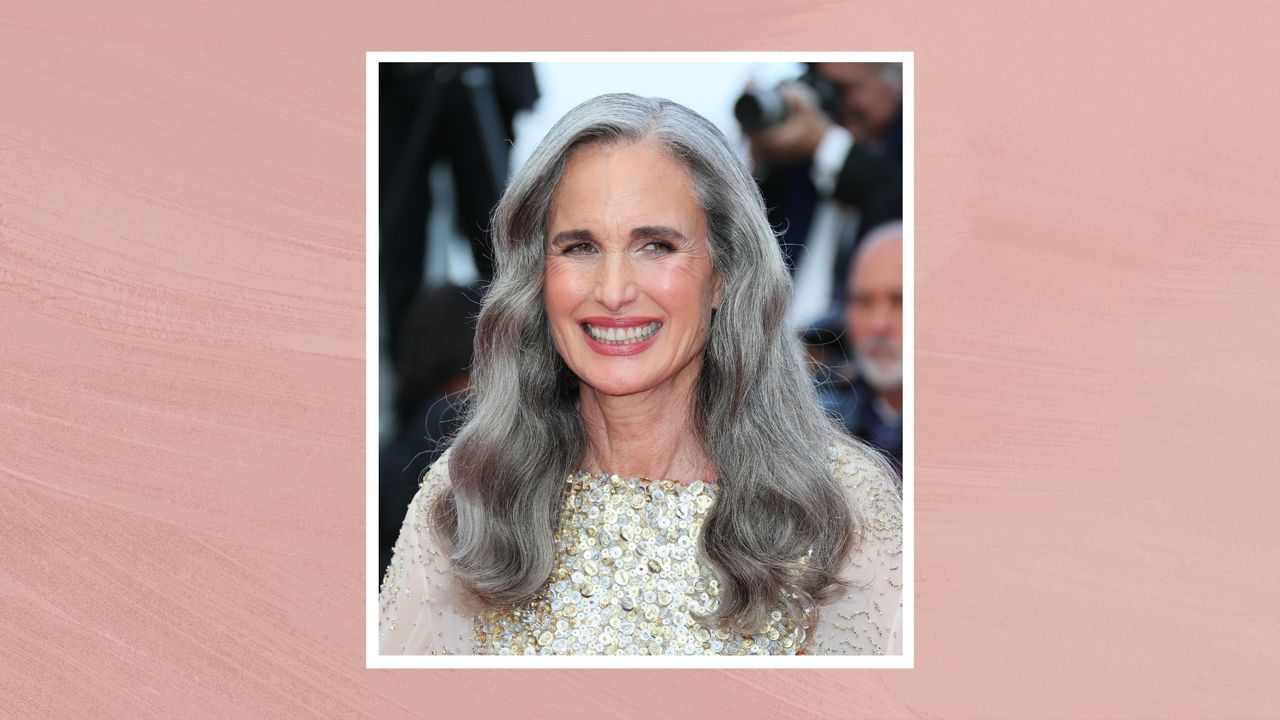 Andie MacDowell wears a gold embellished gown with subtle wavy hair, silver eyeshadow and a pink lip