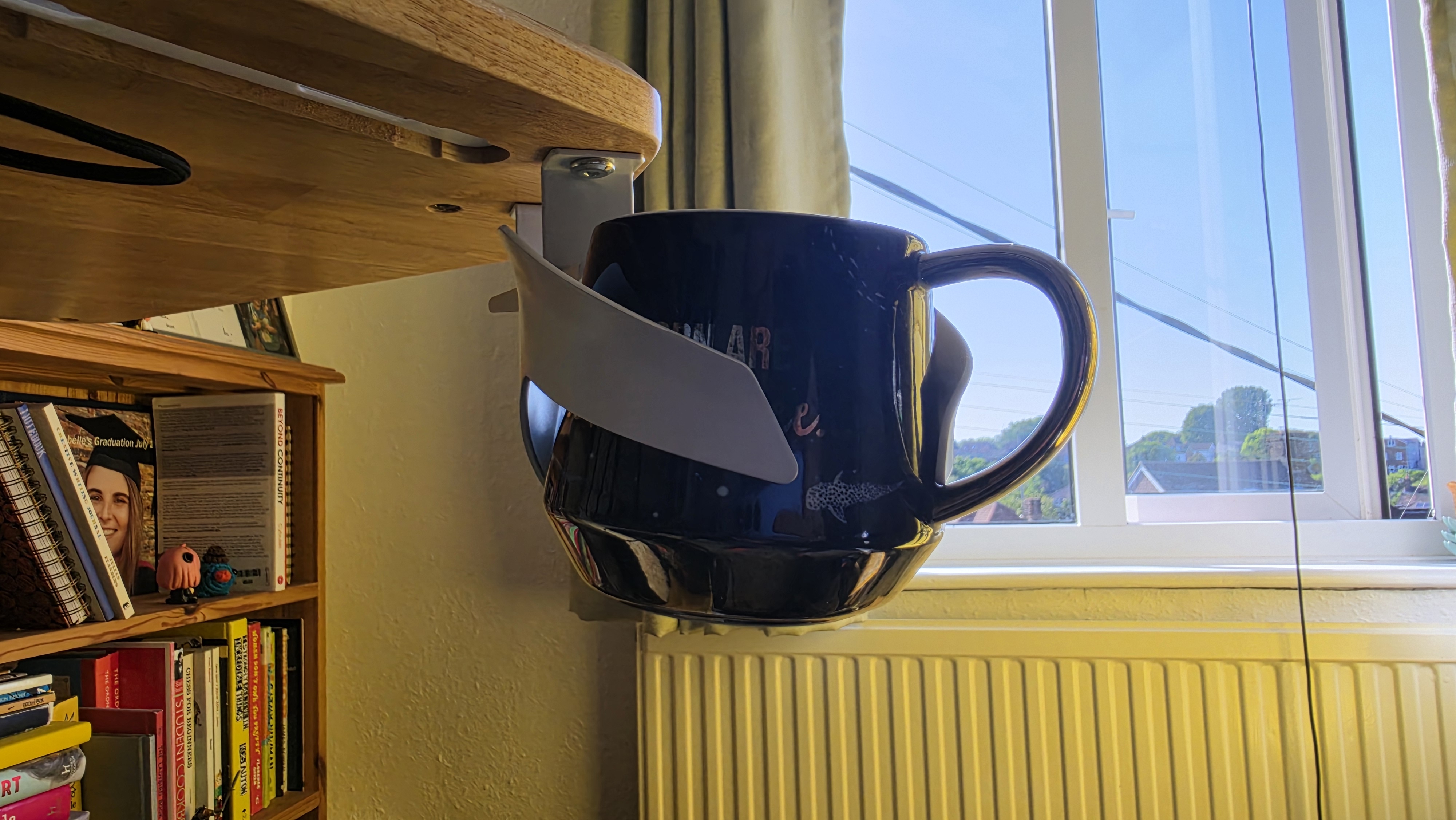 A mug in the Eureka Ergonomic Aero Pro cup holder