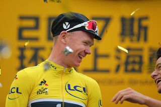 Chris Froome shares a joke with his team