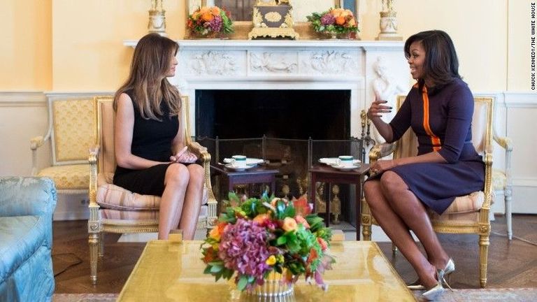 Melania Trump and Michelle Obama talk over tea.