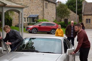 Robert and Aaron leave in Emmerdale