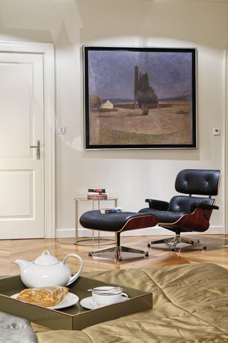 eames lounge chair in a bedroom