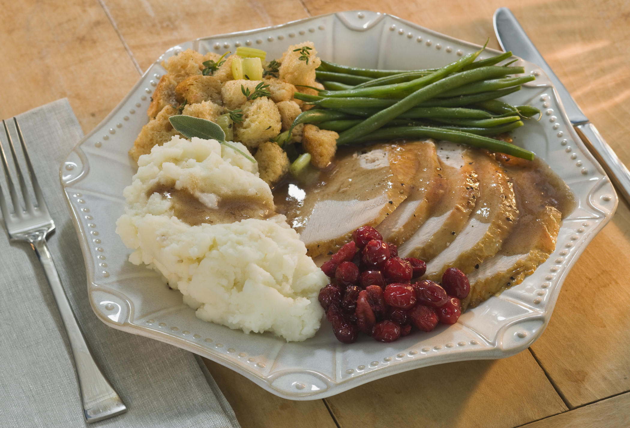 traditional Thanksgiving food items on a plate