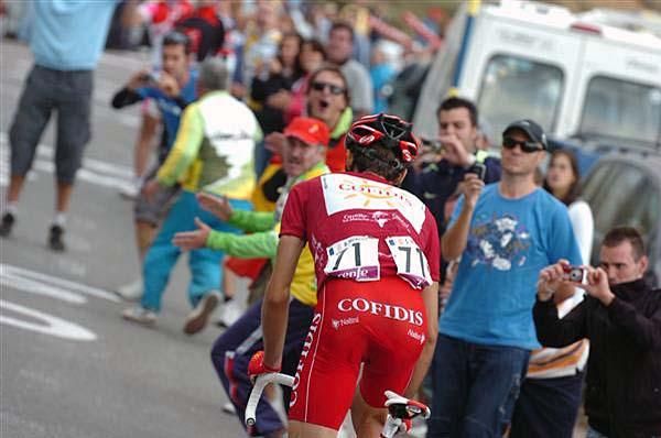 David Moncouti&eacute; (Cofidis) stands up out of the saddle.
