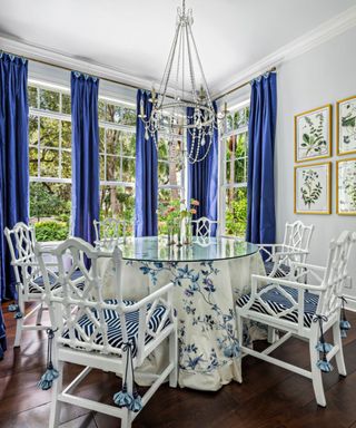 A maximalist dining room decorated with blue and white