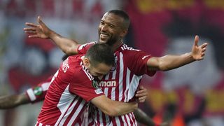 Ayoub El Kaabi of Olympiakos celebrates with teammate Kostas Fortounis after scoring his team's second goal ahead of the 2024 UEFA Europa Conference League Final in Athens on May 29, 2024