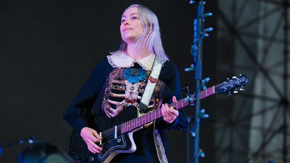 “The knife flipped and hacked right on my knuckle… I play guitar in a weird way”: The bizarre gardening accident that changed the way Phoebe Bridgers plays guitar