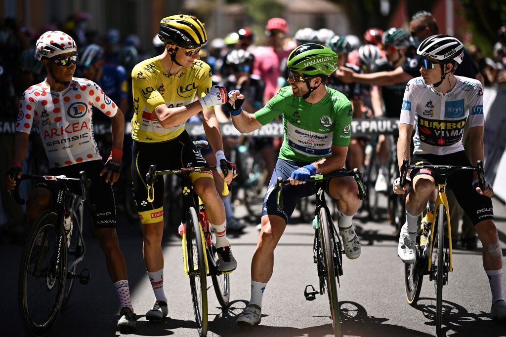 From L Team Arkea Samsics Nairo Quintana of Colombia wearing the best climbers polka dot jersey Team UAE Emirates Tadej Pogacar of Slovenia wearing the overall leaders yellow jersey Team Deceuninck Quicksteps Mark Cavendish of Great Britain wearing the best sprinters green jersey and Team Jumbo Vismas Jonas Vingegaard of Denmark wearing the best youngs white jersey wait prior to the 12th stage of the 108th edition of the Tour de France cycling race 159 km between SaintPaulTroisChateaux and Nimes on July 08 2021 Photo by AnneChristine POUJOULAT AFP Photo by ANNECHRISTINE POUJOULATAFP via Getty Images