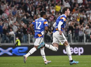 Dusan Vlahovic (right) celebrates scoring for Juventus