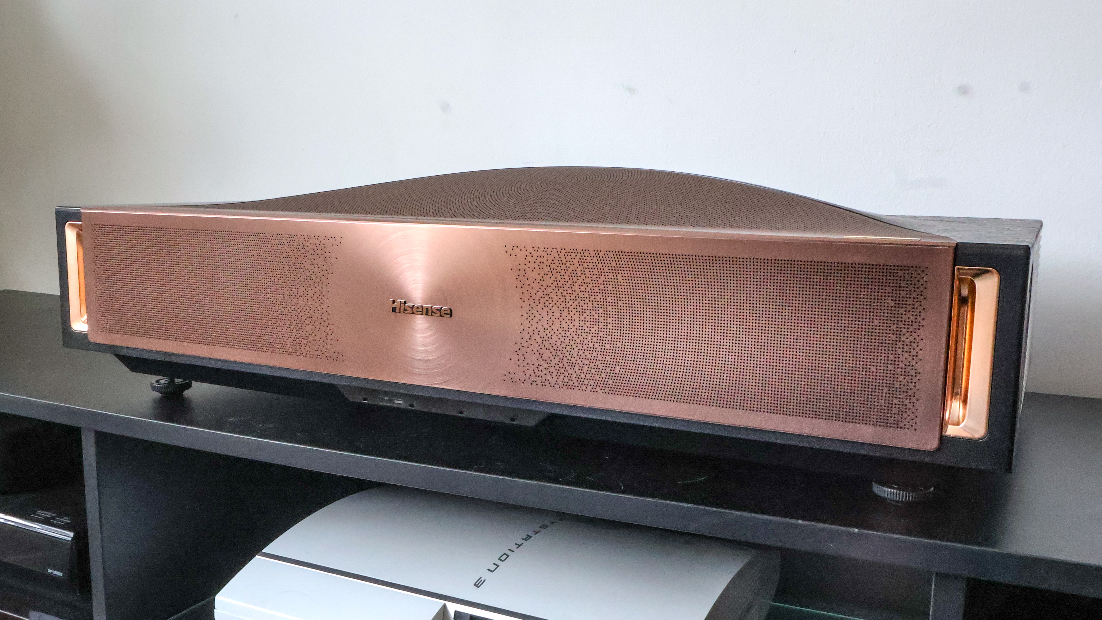 The Hisense L9Q UST projector in a living room