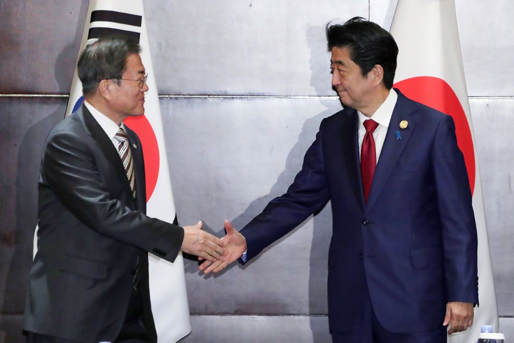 Moon Jae-in with Shinzo Abe.