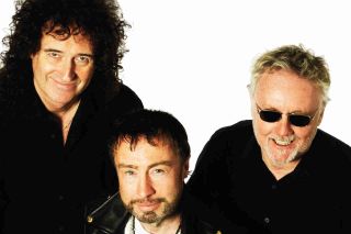 Queen and Paul Rodgers posing for a photograph in 2008