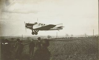 Black & white photo of the original Junkers aircraft lift-off.