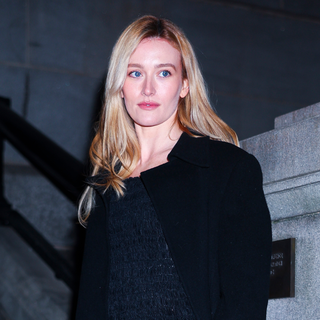 Sarah Pidgeon attends the Khaite fashion show during New York Fashion Week on February 14, 2026 wearing a sleek black outfit seemingly inspired by Carolyn Bessette-Kennedy's timeless '90s minimalism