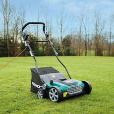 Aldi electric scarifier on a lawn.