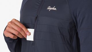 Close up on the chest zip on the Rapha Zip Neck pullover
