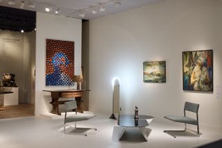 TEFAF 2024 display with chromatic chairs