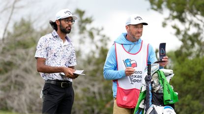 Akshay Bhatia and caddie Ryan Jamison look on during the third round of the 2024 Valero Texas Open