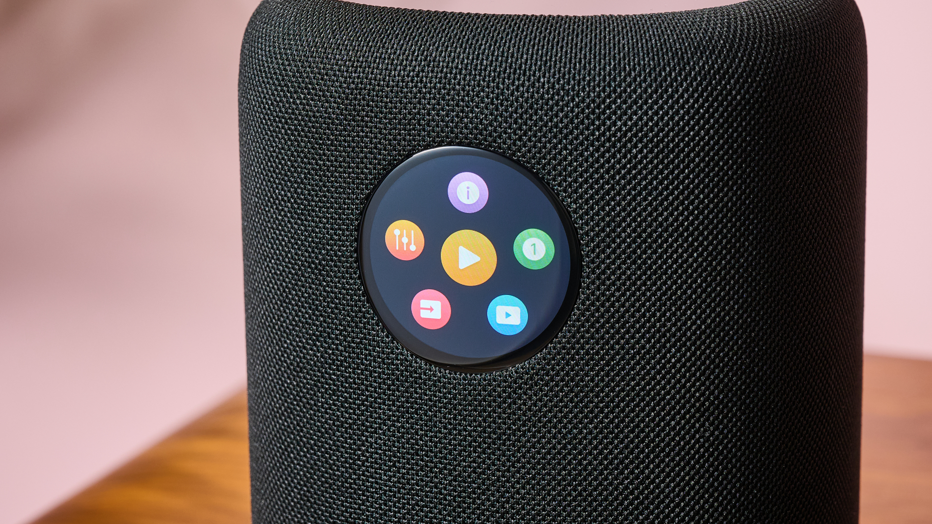 A closeup of the WiiM Sound's screen, showing its app selection screen.