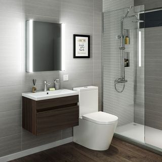 bathroom with grey wall and ceramic wall mount commode and shower