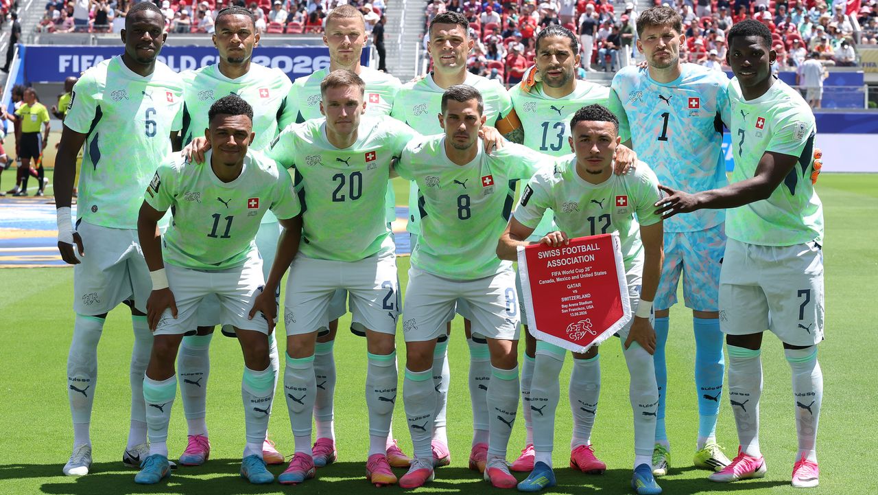 Why are Switzerland playing in green vs Qatar?